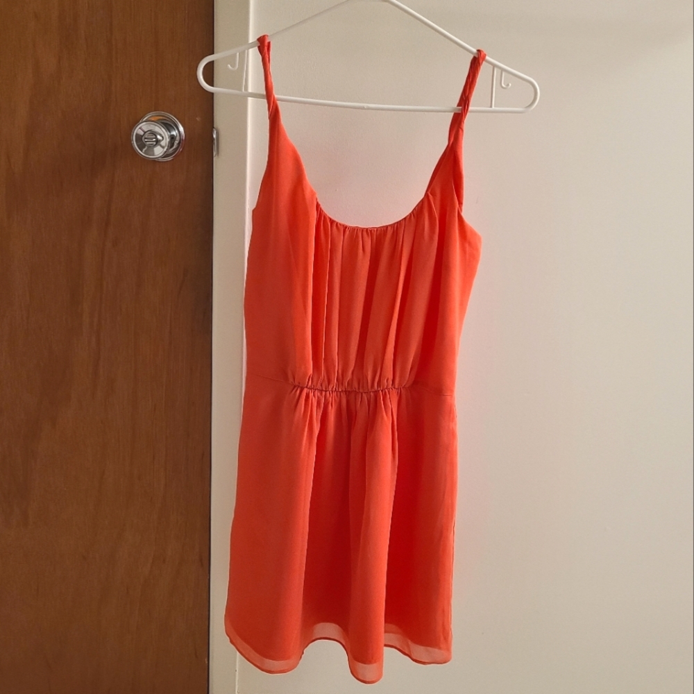 Sleeveless coral chiffon dress